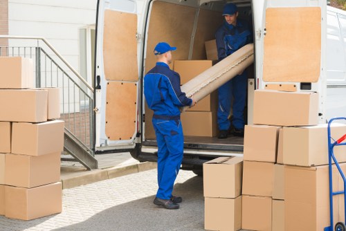 Local van service helping with a move near Clapham streets and flats