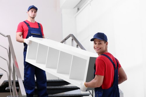 Local home removals team planning a Clapham move with boxes and furniture
