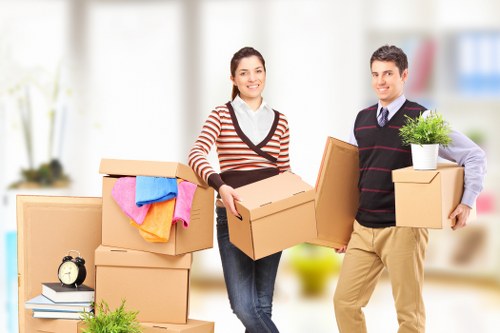 Furniture collection van handling household items near Clapham
