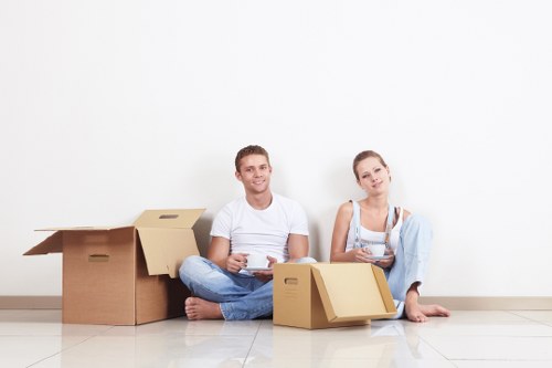 Staff trained in safe lifting techniques during a house move
