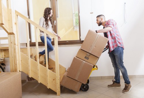Business removals team handling office contents with care in Clapham
